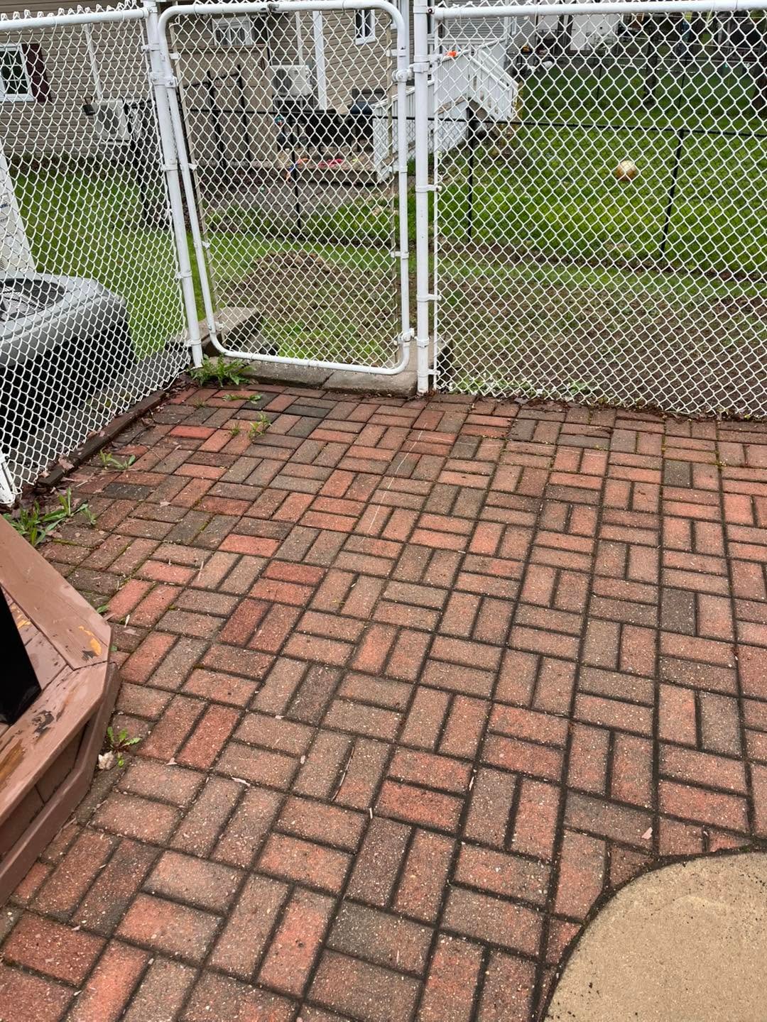Existing brick patio before repair work