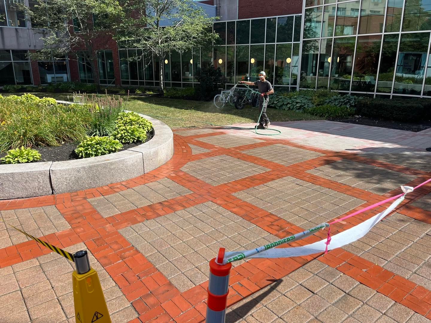 Patterned paver courtyard completed by Express Landscaping